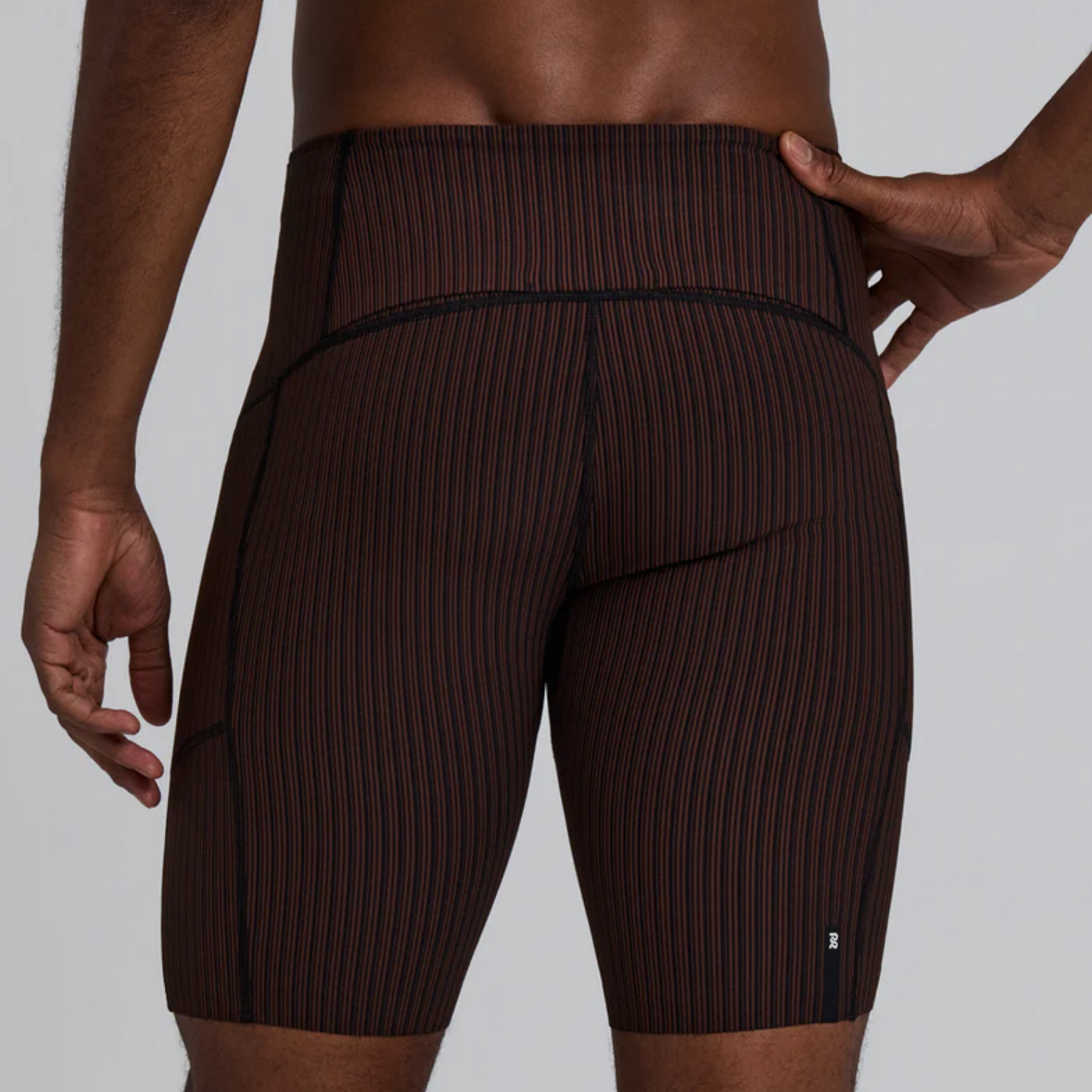 Bandit Running Striped Cadence™ 7 Pocket Lined Half Tights - Cacao/Black