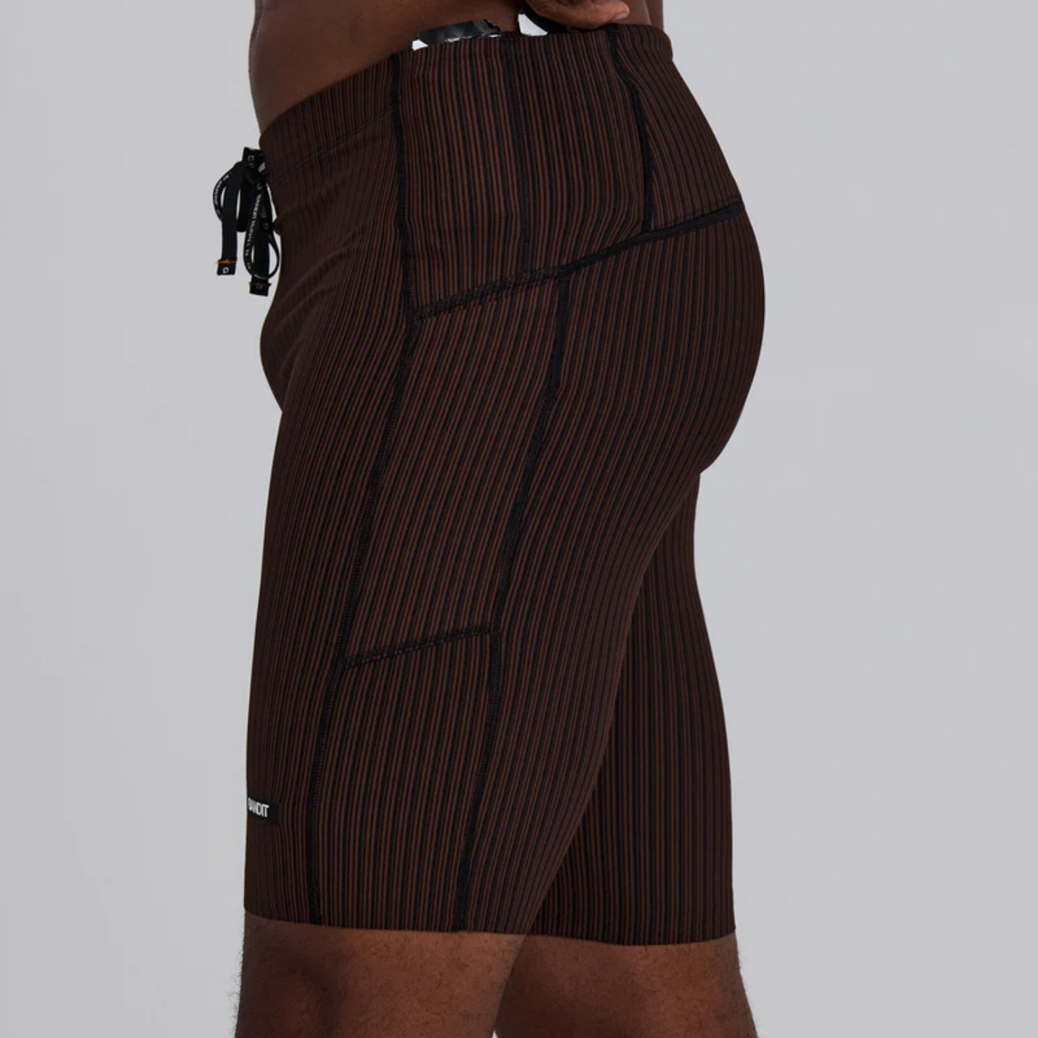 Bandit Running Striped Cadence™ 7 Pocket Lined Half Tights - Cacao/Black