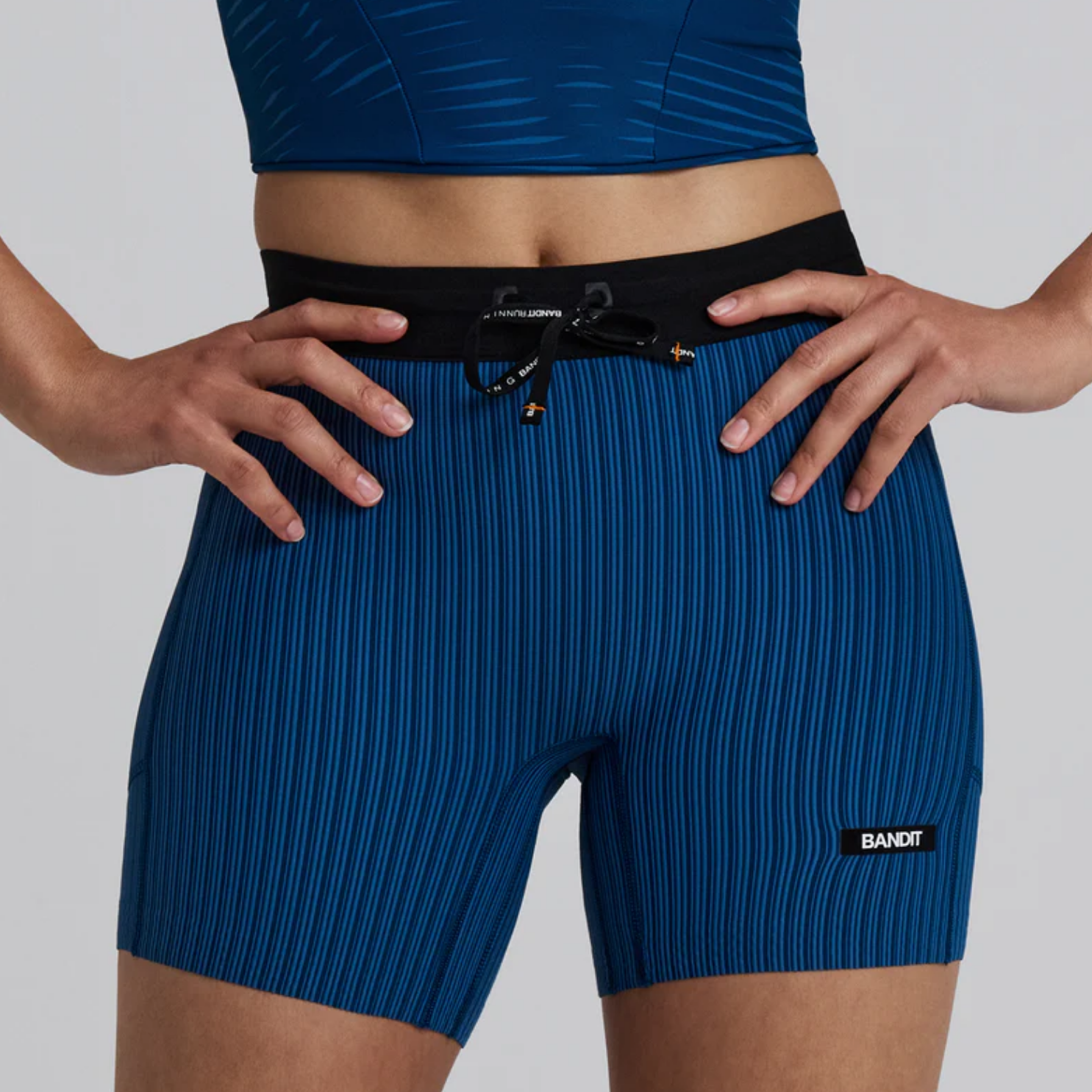 Bandit Running Women's Striped Cadence™ 5" Compression Shorts - Ink Blue/Aegean