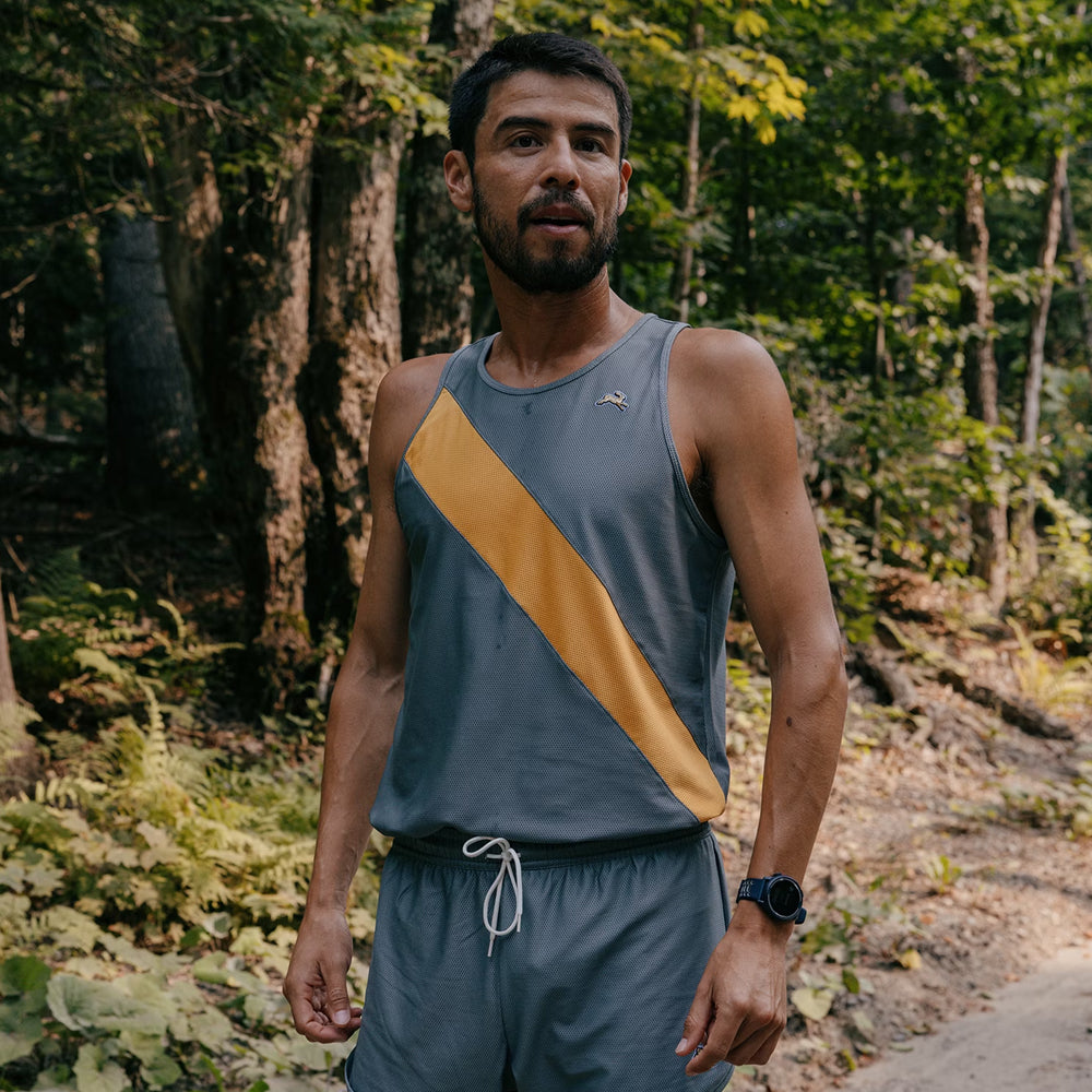 tracksmith-van-cortlandt-singlet-sedona-sage-honey-gold