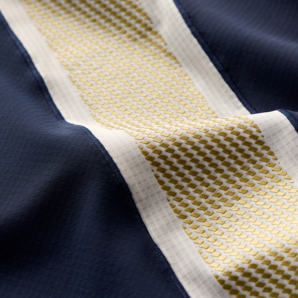 tracksmith-womens-strata-singlet-navy-gold